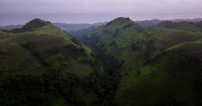 Evergreen Mountain Range Of Teletubbies Hill During Sunset In East Nusa Penida, Bali Indonesia. Aerial Drone Shot