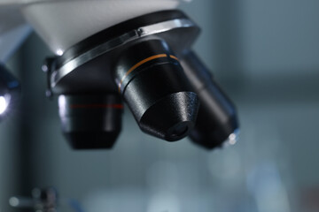 One microscope on blurred background, closeup view