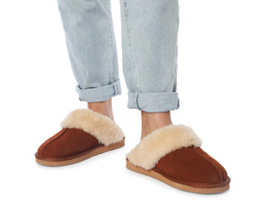Woman in soft slippers on white background, closeup