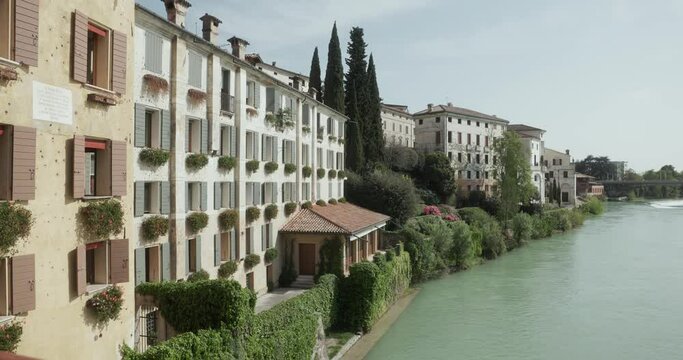 Italian Buildings On The Bank Of Brenta River In Bassano del Grappa, Vicenza, Italy. static shot