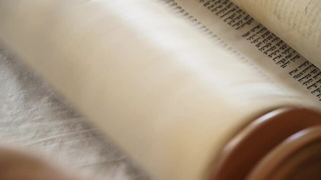 Hand of young boy reading the Jewish Torah at Bar Mitzvah Bar Mitzvah Torah