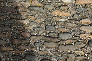 Background stone wall made of grey stones