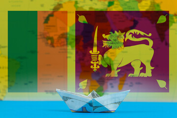 Sea transport of Sri Lanka concept, bulk carrier or ships on sea, paper ship with Sri Lanka flag