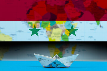 Sea transport of Syria concept, bulk carrier or ships on sea, paper ship with Syria flag, cargo 