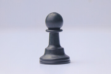 Black Chess Pawn on White Background: Classic Pawn Piece Adds Depth to Your Chess Collection,...