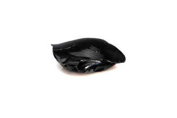 natural obsidian rough gem stone on the white background