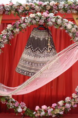 traditional hindu indian  lehenga wedding dress of the bride hanging bridal gown