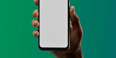 African-American hand with smartphone against green; great for app showcases