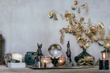 Esoteric Tarot and Crystal Ball Setup with Mystical Decor.