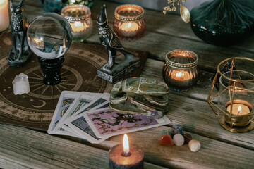 Esoteric Tarot and Crystal Ball Setup with Mystical Decor.