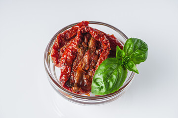 fresh sun-dried tomatoes on a white acrylic background