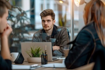 Businessman having meeting with colleagues at office