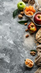 Healthy ingredients including fruits and nuts on a rustic gray background.