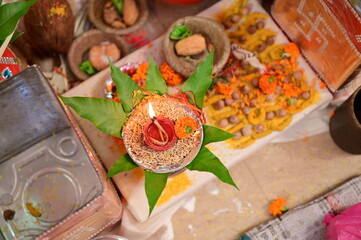 Navgrah Pooja, Traditional Indian wedding ceremony. Items for pooja kalash, diya, betel nuts,...