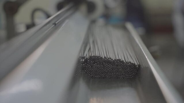 Factory production of heating element wire. Heating exchanger workshop. Mass factory production.