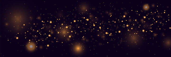 Glowing golden bokeh, sparkling gold dust. Abstract golden luxury light decoration.
