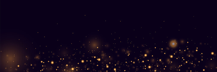 Glowing golden bokeh, sparkling gold dust. Abstract golden luxury light decoration.
