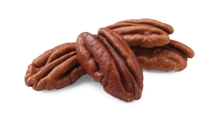 Many tasty pecan nuts isolated on white