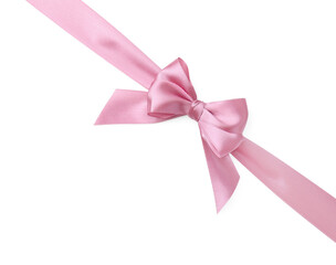 Pink satin ribbon with bow on white background, top view