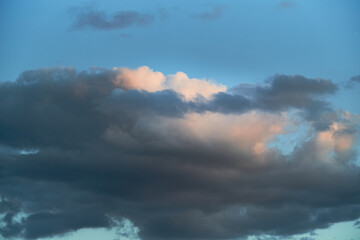 evening light on the clouds in the sky, clouds in the evening sunset