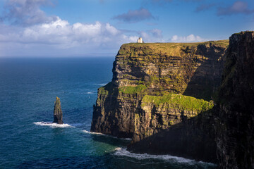 Wild Cliffs of Moher and O'Brien's tower, Ireland. The western Atlantic Ocean coastline of Ireland