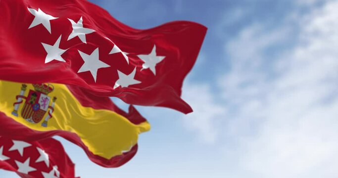 Detail of the Community of Madrid flag waving in the wind
