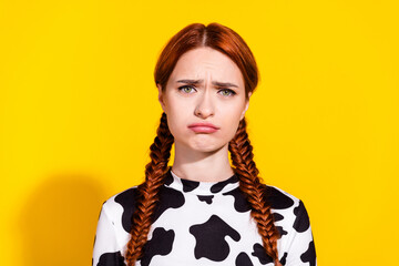 Photo of unhappy upset woman wear cow skin top feeling sad bad news isolated yellow color background