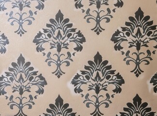 Beige background with gray and black vintage wallpaper pattern on the wall
