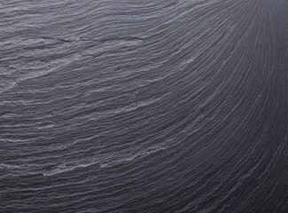 Dark grey black slate texture background. Black stone texture. Black granite slabs background