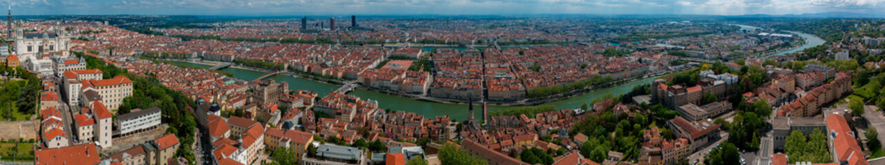 Aerial view of the Basilica of Notre-Dame de Fourvière and all the skyline of the city of Lyon. France.