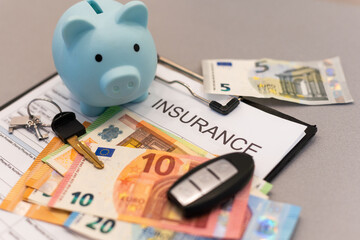 insurance form, folders, piggy bank and money