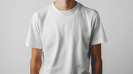 A person wearing a plain white t-shirt, ideal for branding, on a light gray background, Generative AI
