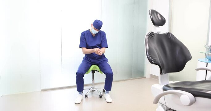 Sitting dentist, dealing with wrist pain.Symptoms and self help exercises, stretching. front view