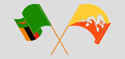 Crossed and waving flags of Zambia and Bhutan