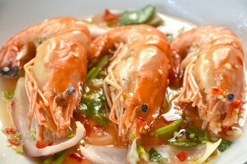 steamed river shrimp dressing Thai spicy and sour sauce salad on plate