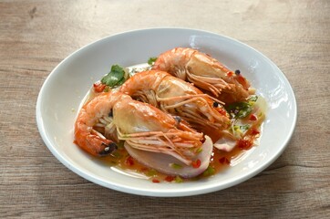 steamed river shrimp dressing Thai spicy and sour sauce salad on plate