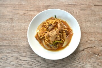 stir fried chicken with slice ginger and black ear mushroom on plate