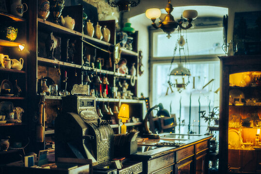 An antique shop with vintage items lining the shelves, showcasing antique treasures.