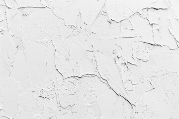 A minimalist background with a smooth plaster texture in stark white, ideal for highlighting other design elements.