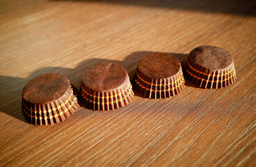 Empty sweets tartlets on table up side down multiple object in a row