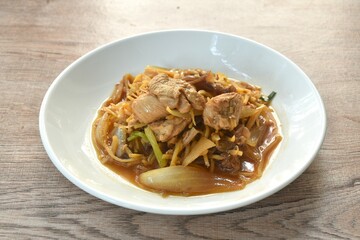 stir fried chicken with slice ginger and black ear mushroom on plate