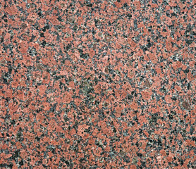 Red granite with black spots