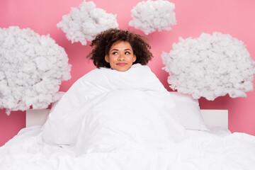 Photo of excited dreamy lady wear pajama lying bed cover blanket looking fluffy clouds isolated pink color background