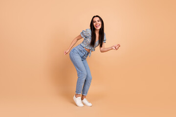 Photo of crazy nice cheerful woman wear blue stylish clothes celebrate holiday event weekend isolated on beige color background