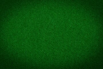Fototapeta premium green paper with vignette a background or texture 