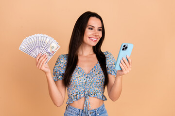 Photo of stunning lovely woman wear blue trendy clothes read news hold cash lottery jackpot...