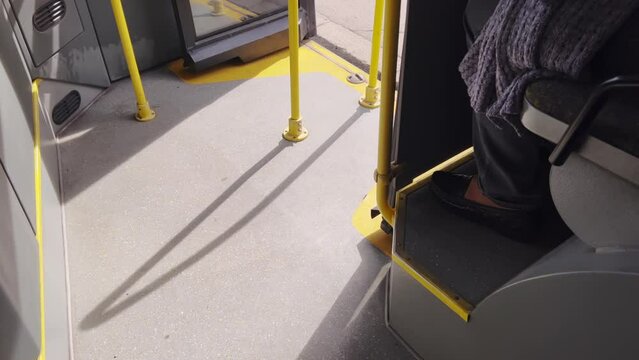 Public transport shuttle bus door opening at the station or bus stop