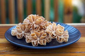 Crispy Lotus Blossom Cookie is a traditional Thai dessert that has a beautiful appearance similar...
