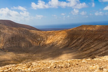 Hiking trail to Caldera Blanca. Interior the Caldera Blanca volcano. Los Volcanes Natural Park, Las Palmas, Lanzarote, Canary Islands, Spain