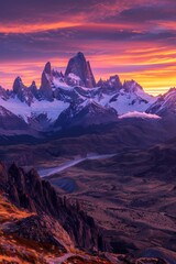 A panoramic view of a jagged mountain range at sunset, painted in fiery orange and purple hues